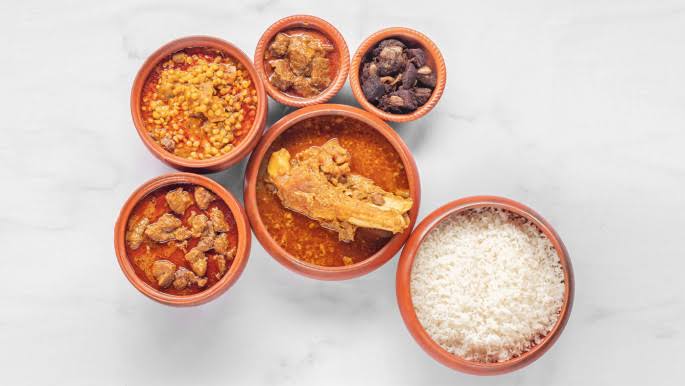 A Chittagong Mezban spread with Mezbani Gosht, chonar dal and plain rice
